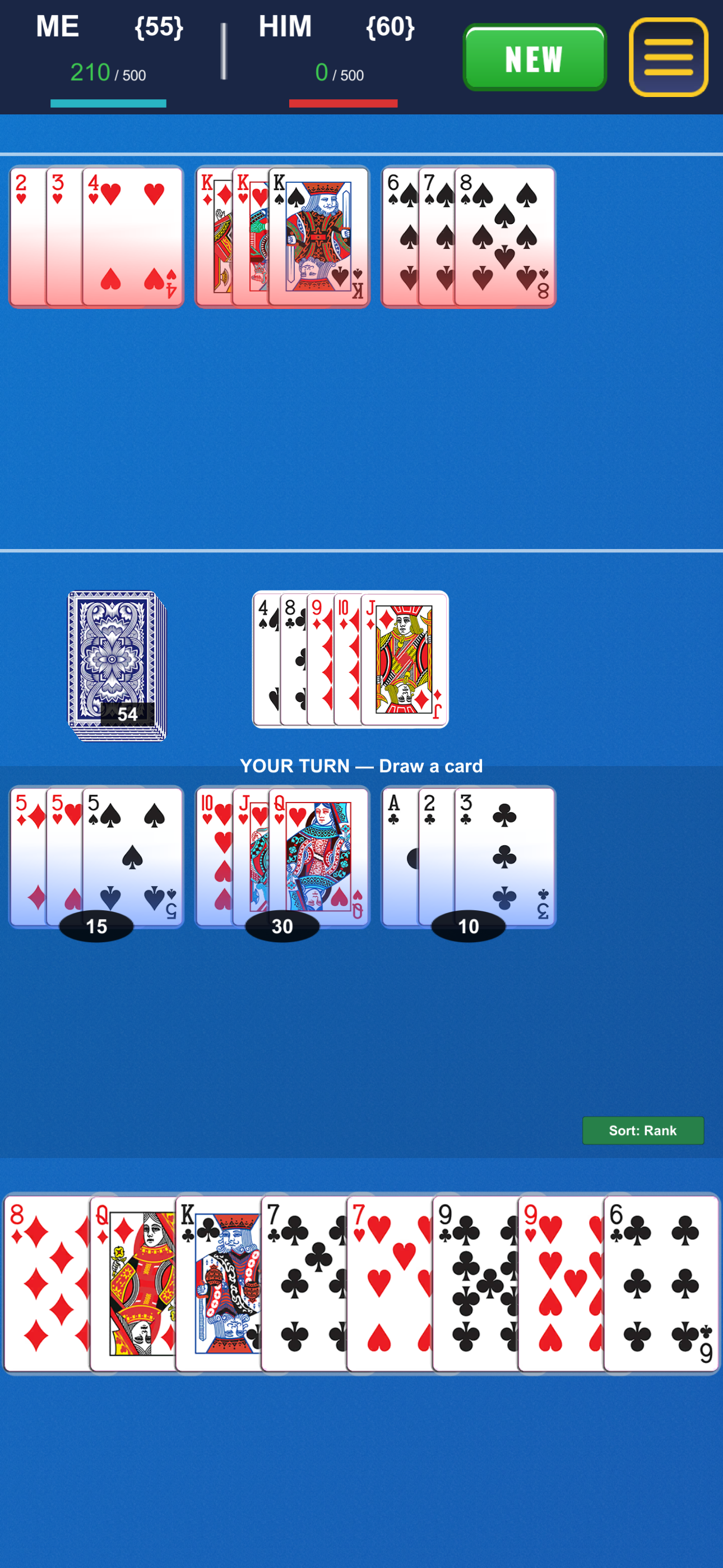 Four Jacks melded on the table — high-value meld in play